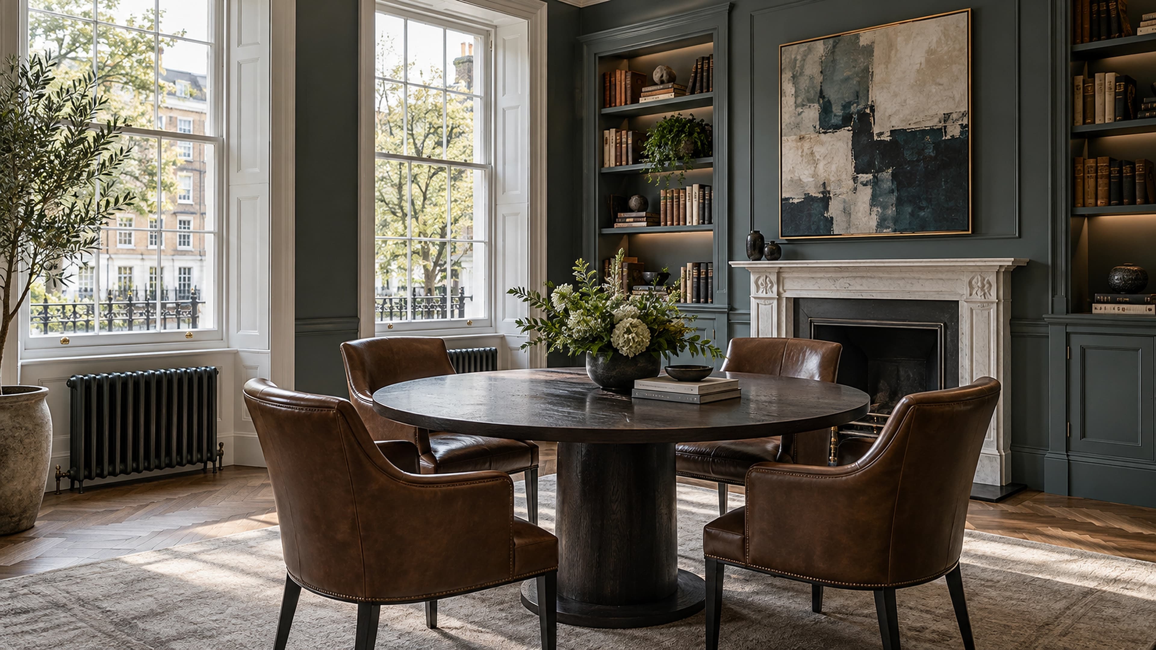 A refined private meeting room with tall sash windows